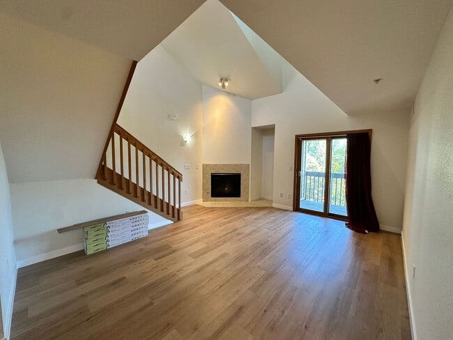 Building Photo - Stylish 3rd Level, Private 2 bedroom Apartment With LVP Flooring, Decks, Gas Fireplace & In-Unit ...