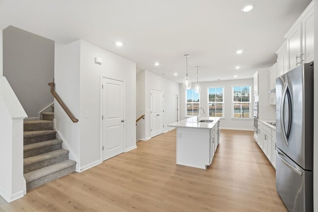 Building Photo - Brand-new three-story townhome in the University area at Senata at Research Park!