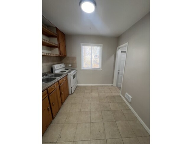 Building Photo - SECTION 8 WELCOME!! Three bedroom two bath...