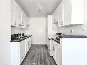 Building Photo - "Chic 1-Bed Oasis with Central Vacuum & Ha...
