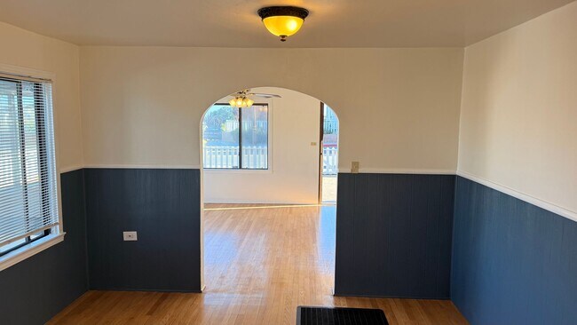 Building Photo - This two-bedroom, one-bath home in Upper Seaside