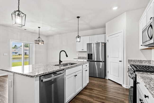 Building Photo - Modern 4BR Home with Screened Porch & Pond Views | Sun Colony, Longs SC