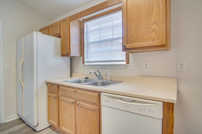 Building Photo - Lakefront Living in Gulf Breeze – Spacious...