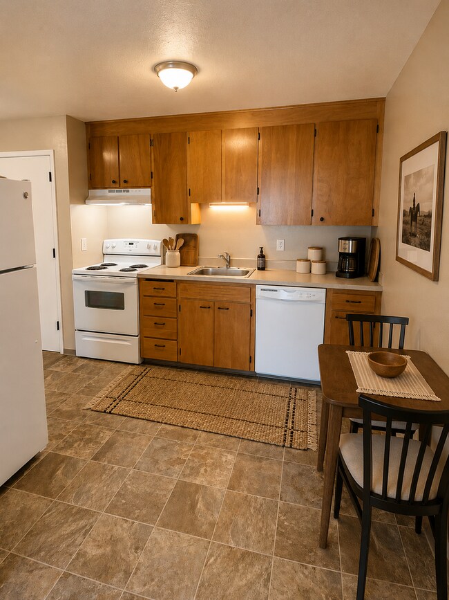 Building Photo - Keyless Entry • On-Site Laundry • Free WiFi