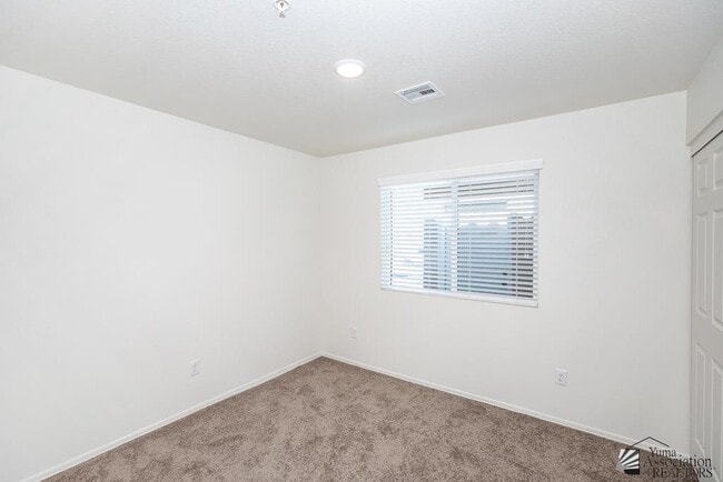 Building Photo - 7171 E 38th Ln