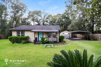 Building Photo - Peaceful 2-Bed Gem with Spacious Yard in J...