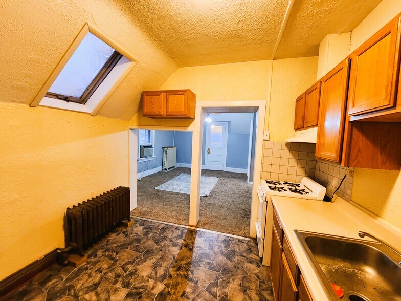 Kitchen to living room - 53 W 9th St
