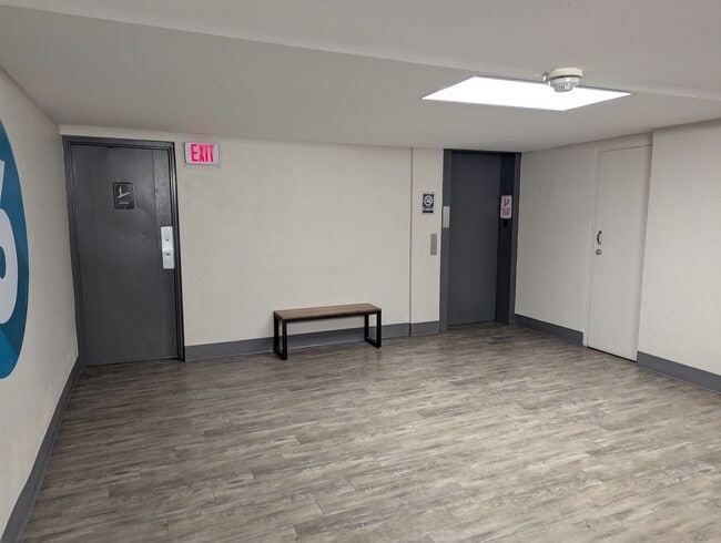 Building Photo - High Rise Living Directly Across the Street from Campus!