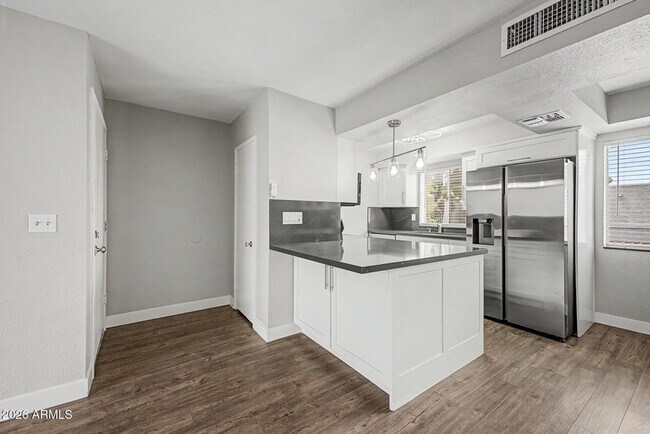 Building Photo - 4554 E Paradise Village Pky N