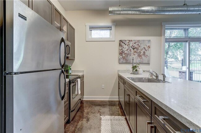 Building Photo - Now Available – Partially Furnished Luxury Condo with Rooftop Terrace | Ideal for Incoming VCU St...