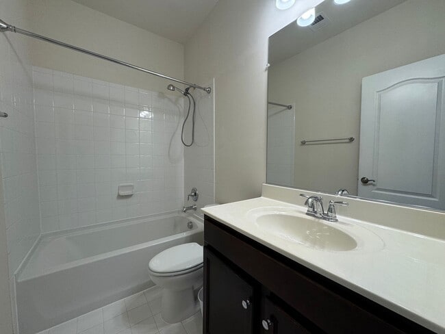Building Photo - Stylish 3 Bed 3 Bath Townhome With Patio A...