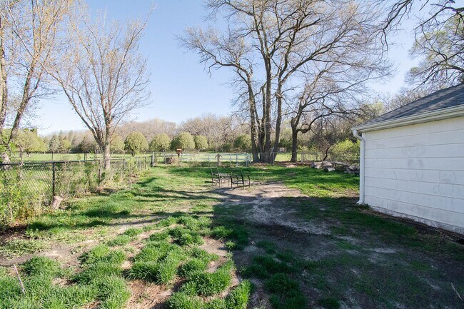 Building Photo - Fenced Yard, 2-Car Garage + Quiet Location!