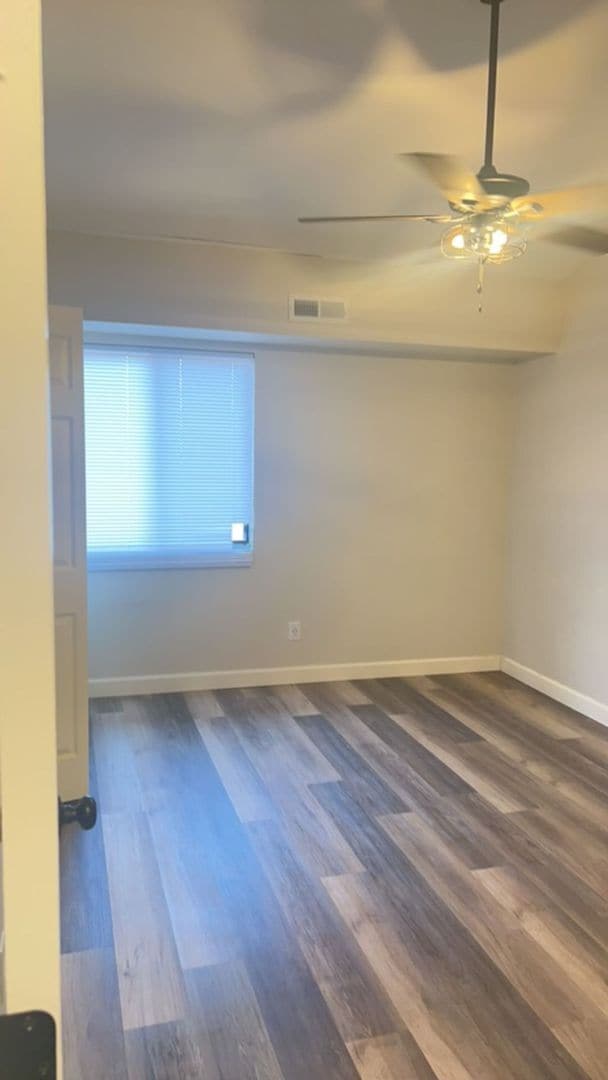 Building Photo - Fun and Stylish Living at Madison Manor! Top-Floor Condo with Vaulted Ceilings and Skylights