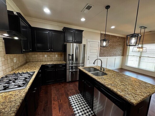 Building Photo - Home in Tech Corridor/Research Park with FENCED YARD and BONUS ROOMS