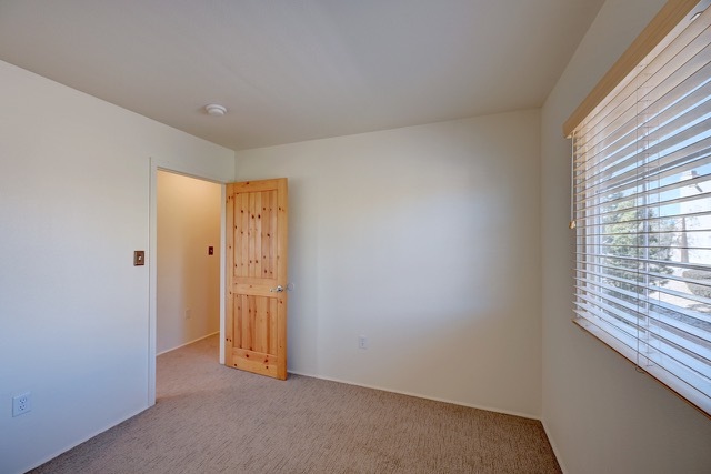 Unit 1011--Bedroom 2 opens to central hallway - 2210 Miguel Chavez Rd