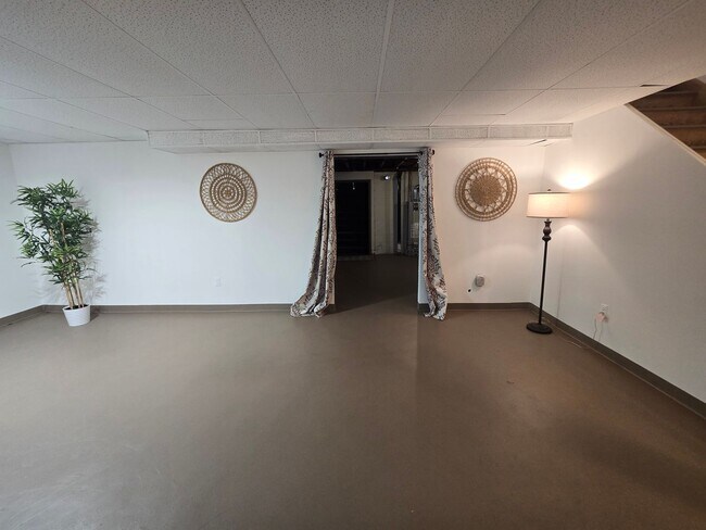 Building Photo - Updates abound at this SPACIOUS, half duplex with 3+ off-street parking spots, 3-bedrooms and 2 f...