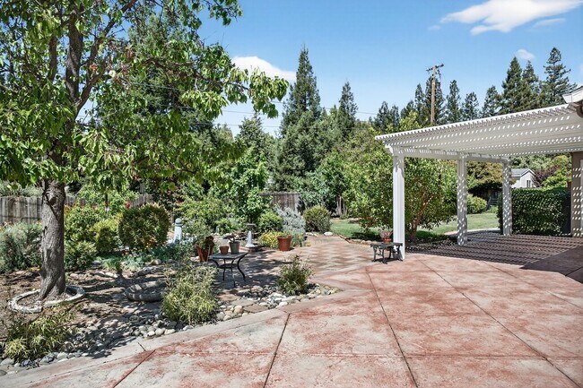 Building Photo - 2,003 Sq Ft Modern 4BR/2BA: Solar, EV Charging & Private Orchard!