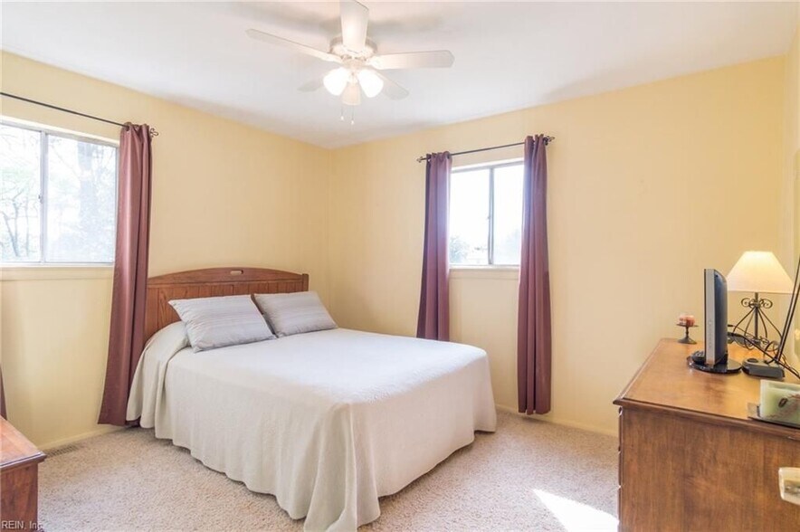 carpet has been removed and hardwood floors finished, painting in progress (shown in later pictures). - 301 Pepper Mill Ct