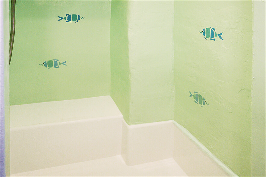 Pristine Shower with PowerSpray Shower-Head, built-in bench, and painted fish - 12 S Venice Blvd