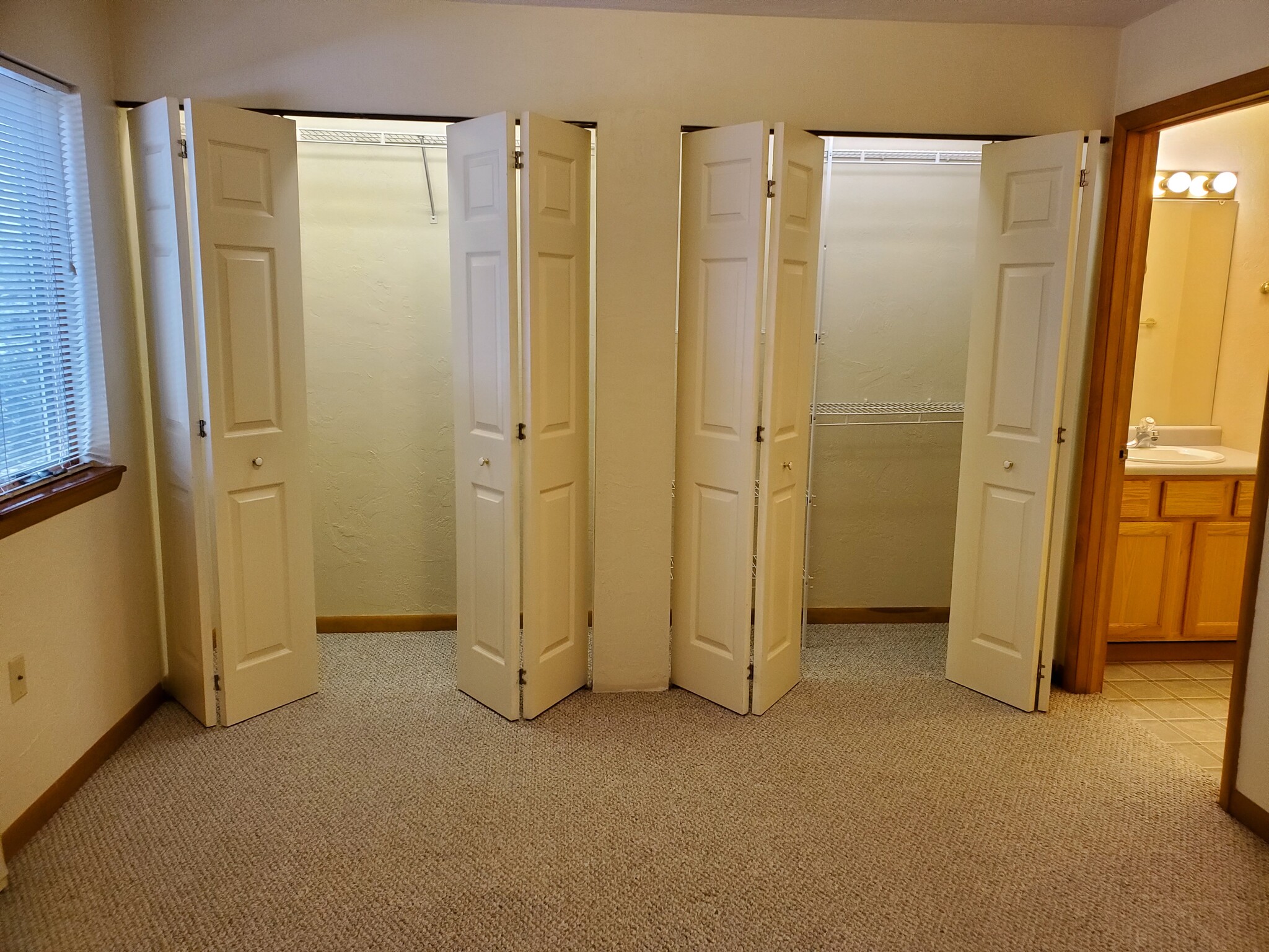 Bedroom with lighted closets - 202 S Maple Ave