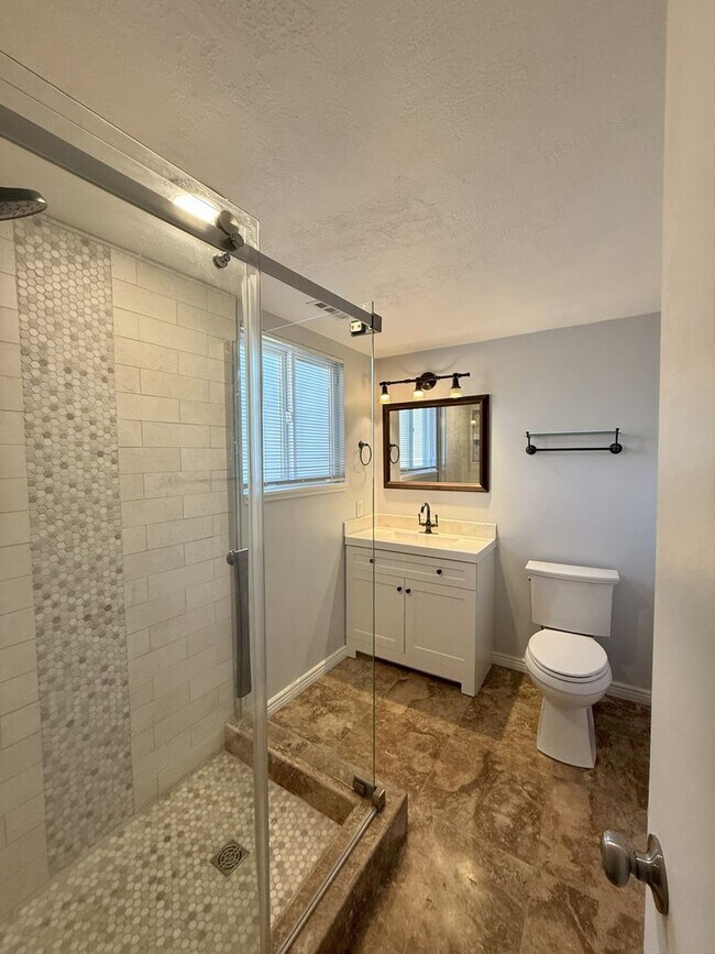 Building Photo - Spacious Comfort Meets Practical Living in...