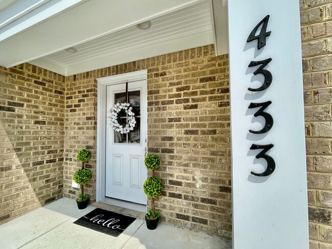 Building Photo - Practically New & Available NOW! Americana Luxury Townhomes! Pet Friendly! Attached Garage! All A...