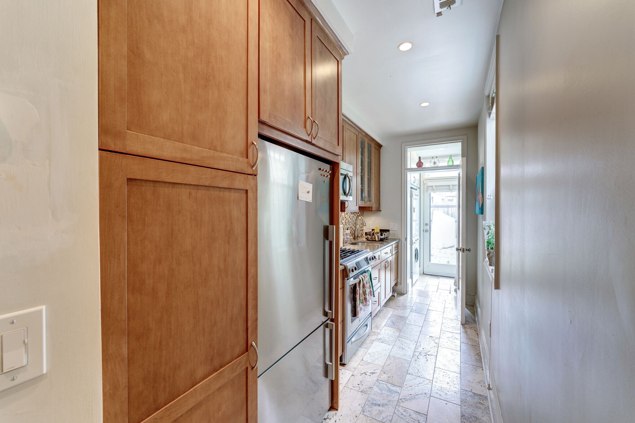 Natural cherry cabinetry provides space for cookware & dishes! - 602 14th Pl NE