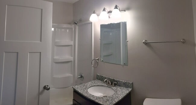 Building Photo - Conveniently located Riverbend Apartments feature a quiet community with a large green space