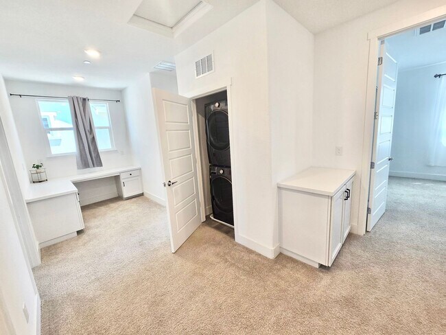 Building Photo - Elegant & Functional – Your Spring Lake Dream Home Awaits