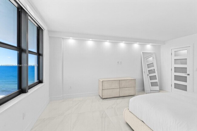Building Photo - 9801 Collins Ave