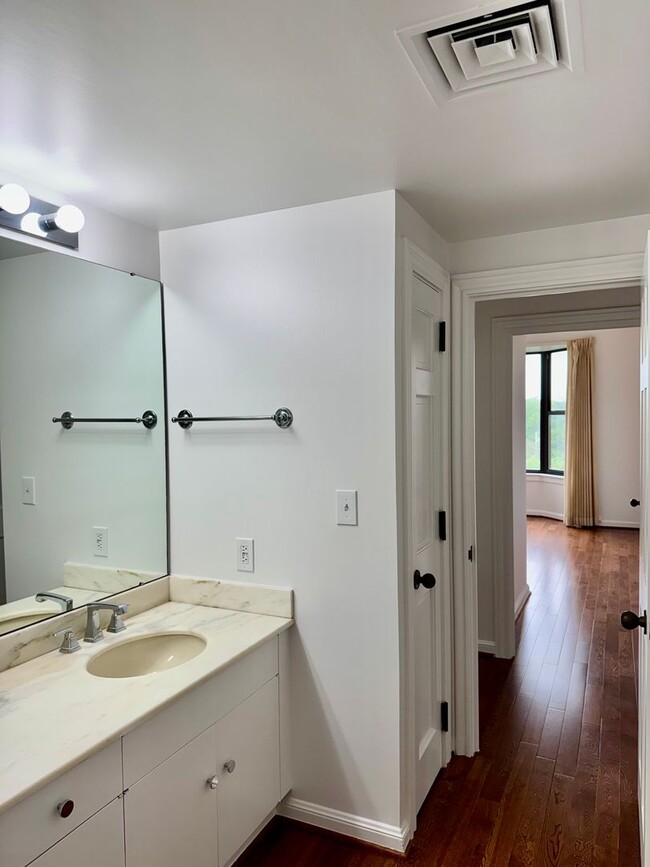 Building Photo - Experience Luxury and Prestige at Yorktown Condominiums