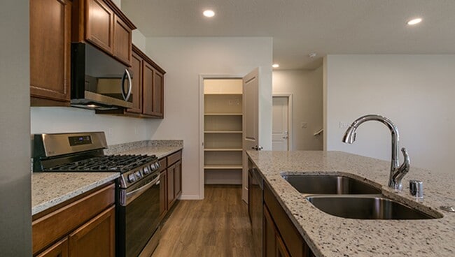 Building Photo - New ST FE Town Home