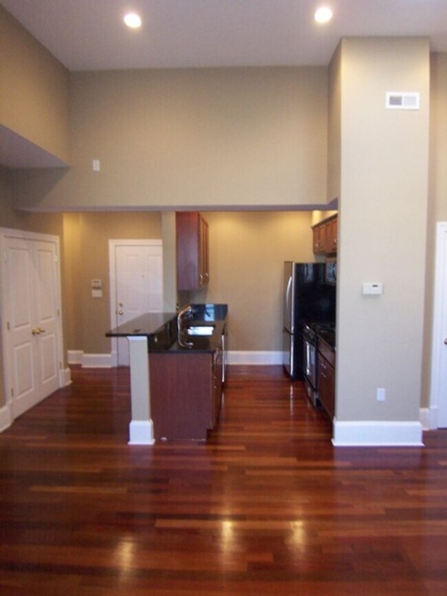 Building Photo - Be Majestic at the Majestic Condominiums! ...