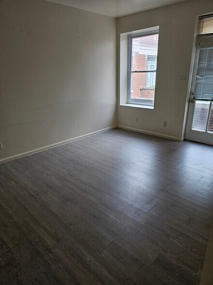 Living Room with balcony - 2023 S Compton Ave