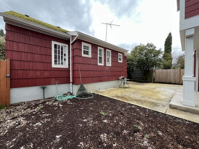 Building Photo - Classic Brick Portland Home on Stark Street with Dual Living Areas and Two Full Kitchens