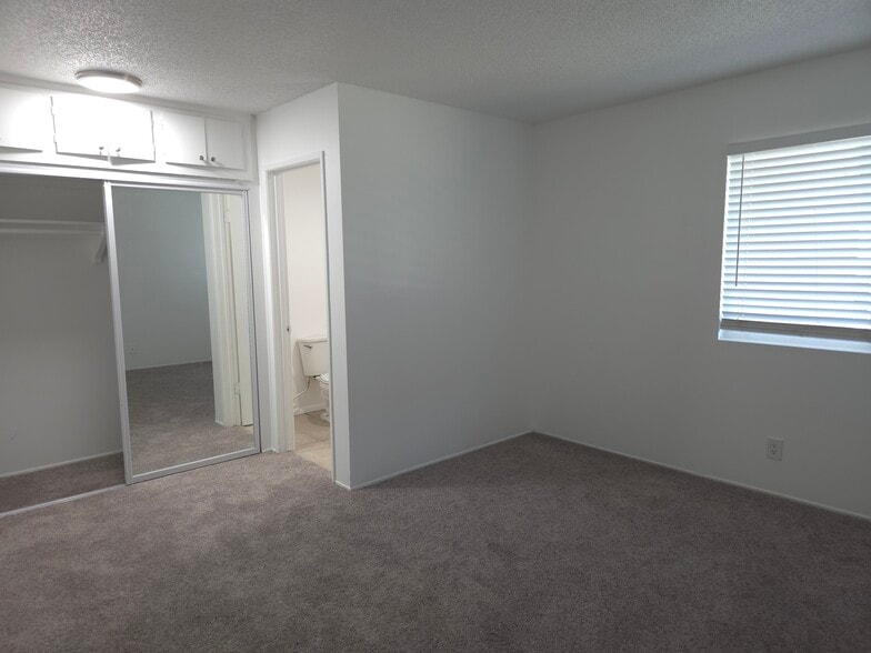Bedroom 1 with new carpet - 3455 Elm Ave
