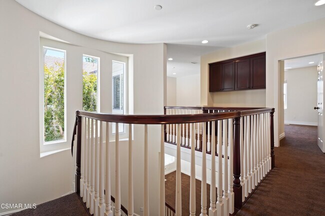 Building Photo - 6077 Mandeville Pl