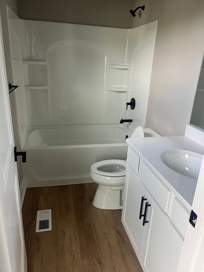 Building Photo - New Construction, 2 bed, 3 bath Row Home, with 2 car garage, fireplace, and rooftop deck!