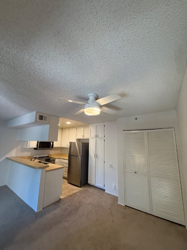 Building Photo - Spacious 3-Bedroom, 2-Bath Multi-Level Home with Balcony, In-Unit Laundry & Dual Parking