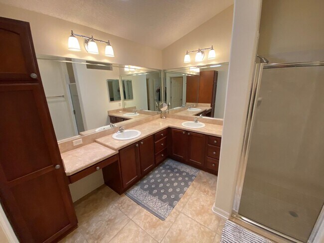 Building Photo - SEASONAL RENTAL. Large 4 Bed + 4 1/2 Baths Home, w/Views of the Jacaranda Golf Course and Lake in...