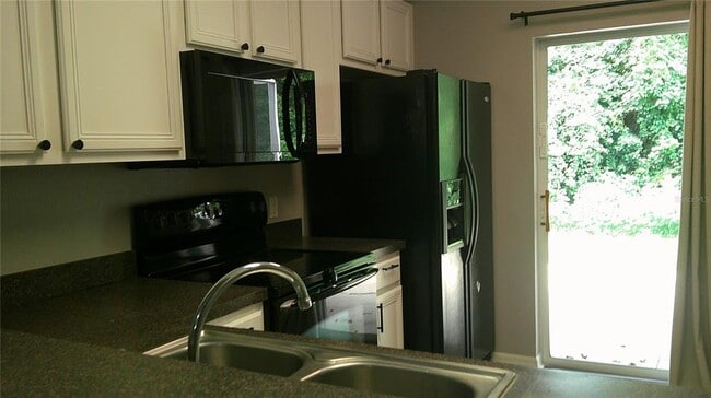 Building Photo - 5718 Fishhawk Ridge Dr