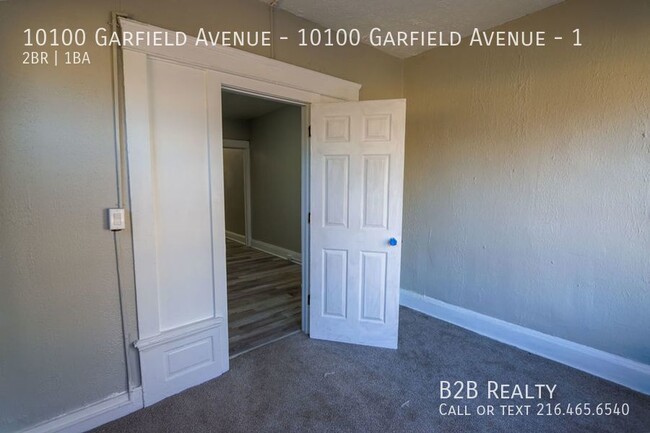 Building Photo - "Charming 2-Bedroom Oasis: Your Perfect Bl...