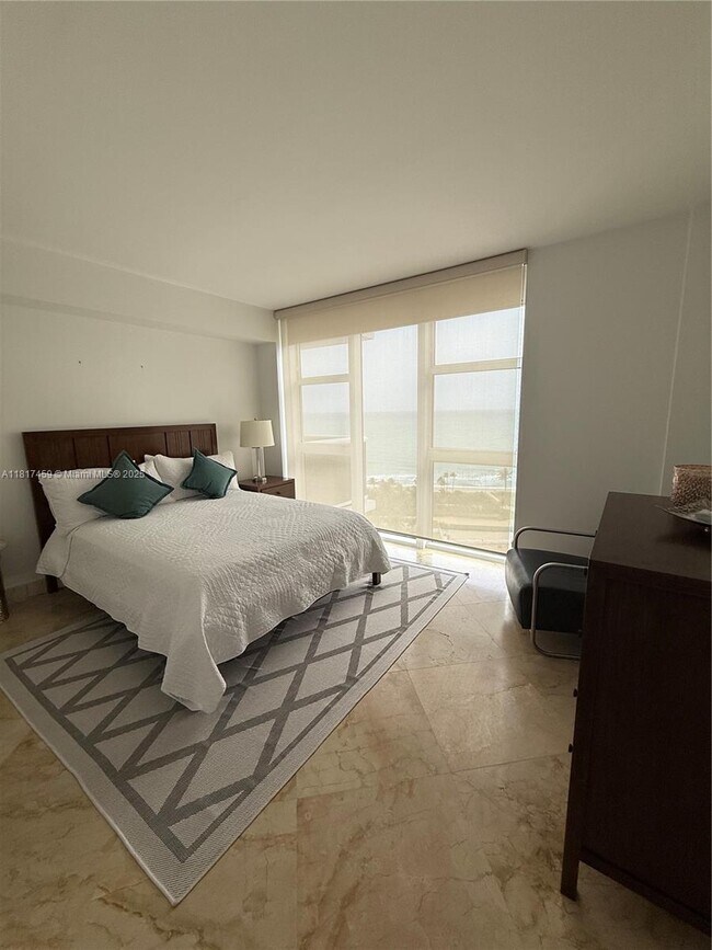 Building Photo - 10275 Collins Ave
