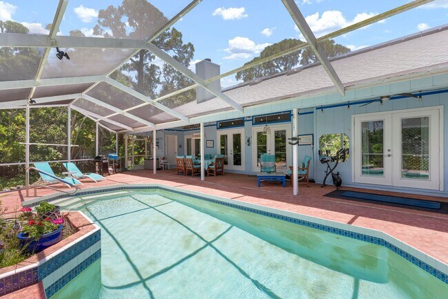 Building Photo - ** STUNNING 4 BEDROOM 2 FULL BATH/ 2 HALF BATH HOME WITH A PRIVATE POOL LOCATED JUST MINUTES FROM...