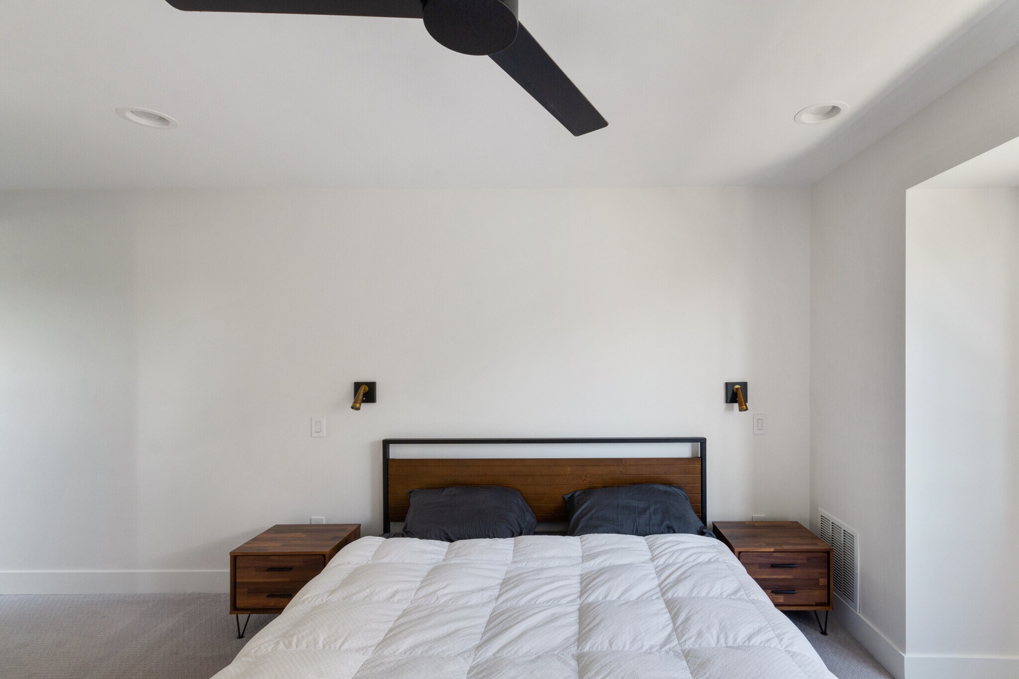 Master bedroom on second floor has two built in lights in the wall - 963 Tennyson St