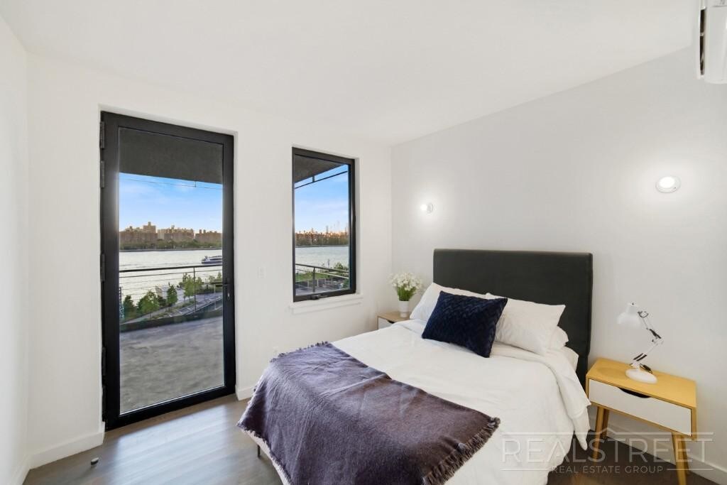 Building Photo - Waterfront Luxury 2 BED with Wrap arround ...