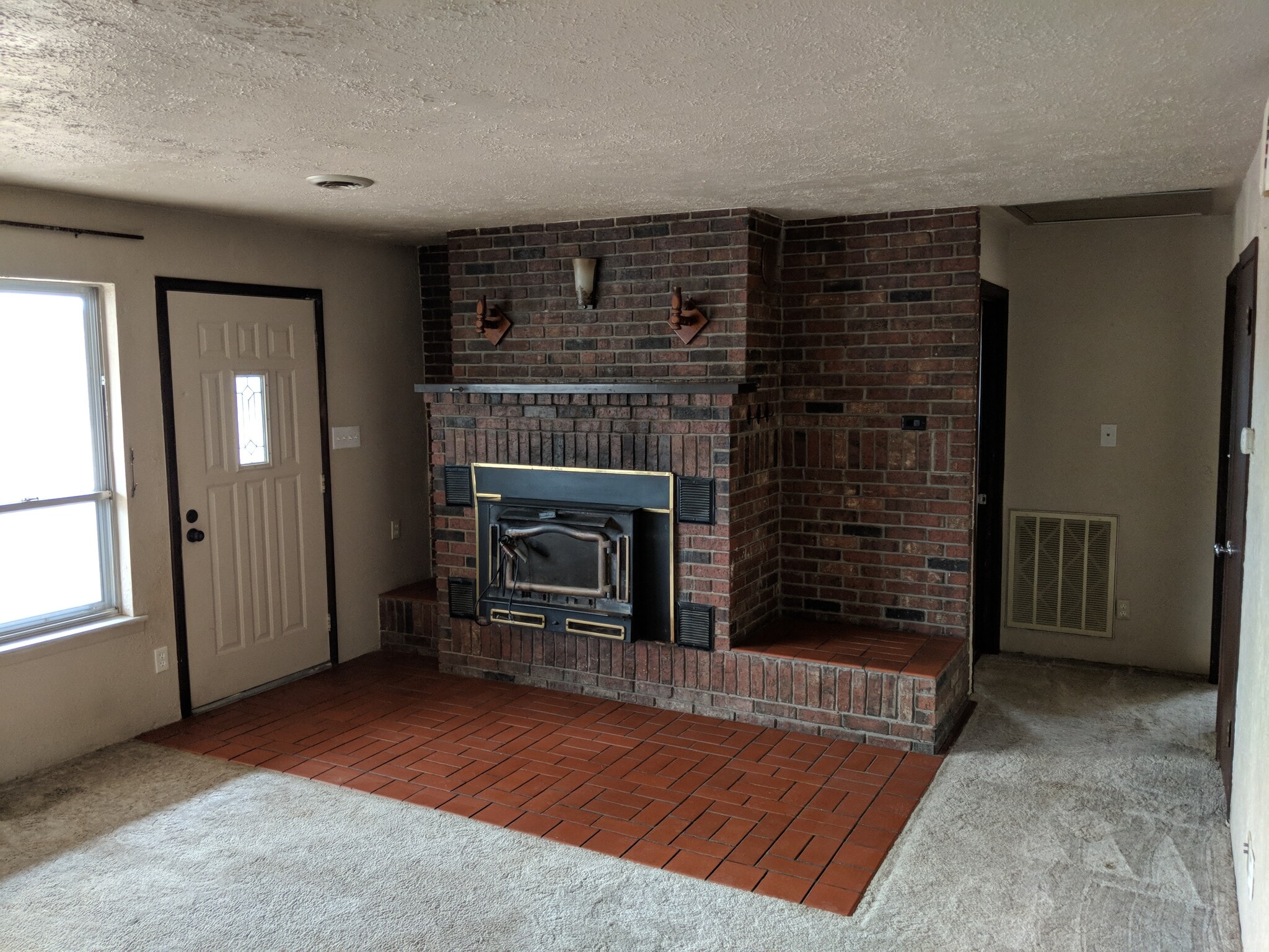 Living Room. We are replacing the carpet with premium LVP. - 5235 Highway NN