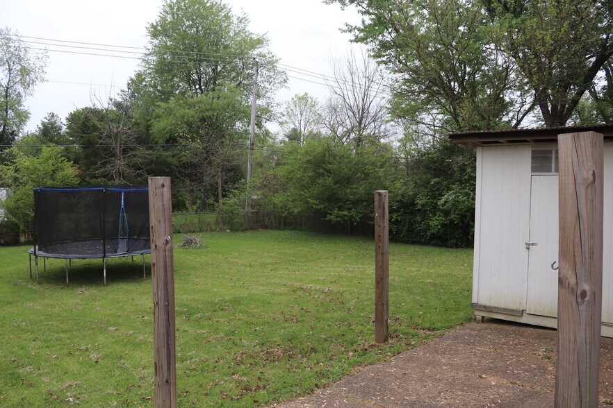 Building Photo - 6810 Village Green Blvd