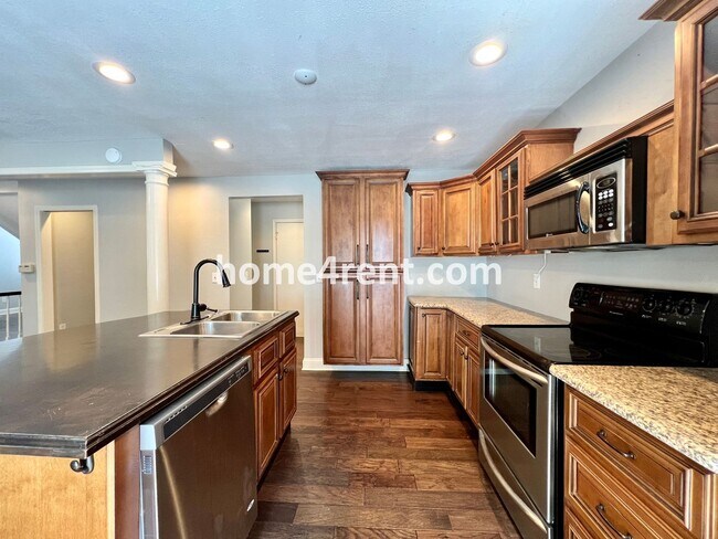 Building Photo - Fantastic Home in Blue Valley Schools w/ Hardwood Floors, Open Layout, Granite Counters, Finished...