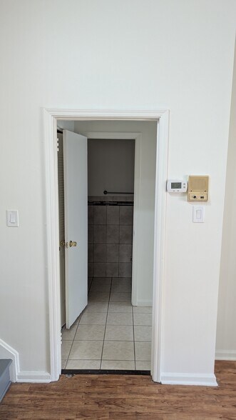 To powder room and Laundry - 1718 Redwood Ct